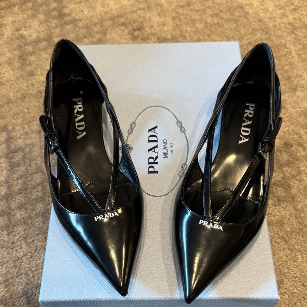 Prada black ballet flats with a slight heel.  Size 5 worn once.